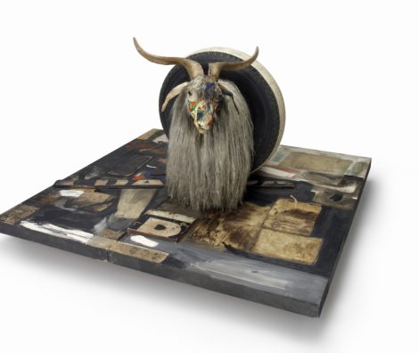 Monogram 1955-59 Combine: oil, paper, fabric, printed reproductions, metal, wood, rubber shoe-heel, and tennis ball on two conjoined canvases with oil on taxidermied Angora goat with brass plaque and rubber tire on wood platform mounted on four casters 106.7 x 135.2 x 163.8 cm Moderna Museet, Stockholm. Purchase with contribution from Moderna Museets Vänner/The Friends of Moderna Museet © Robert Rauschenberg Foundation, New York 