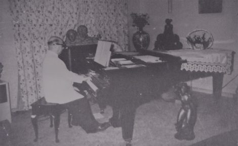 Camille Gheysens composing, 1950s (?)