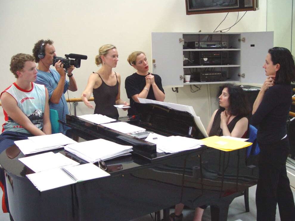 Meryl Tankard, Elena Kats-Chernin at the piano, and dancers of the Australian Ballet discuss the creation of 'Wild Swans', 2003. Photo: © Regis Lansac